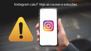 Imagem de uma mão segurando um smartphone com a tela do Instagram aberta e um ícone de alerta amarelo ao lado, indicando erro ou instabilidade na plataforma.